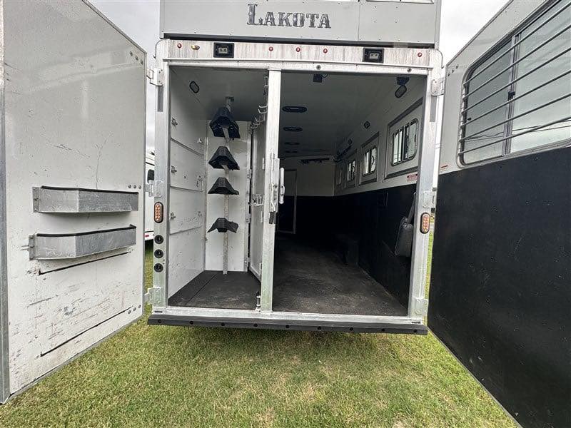 2014 Lakota Bighorn 8416, Generator, Couch, Dinette 17’ Shortwall, 4 Horse Trailer, 12′ Slide. - Image 5