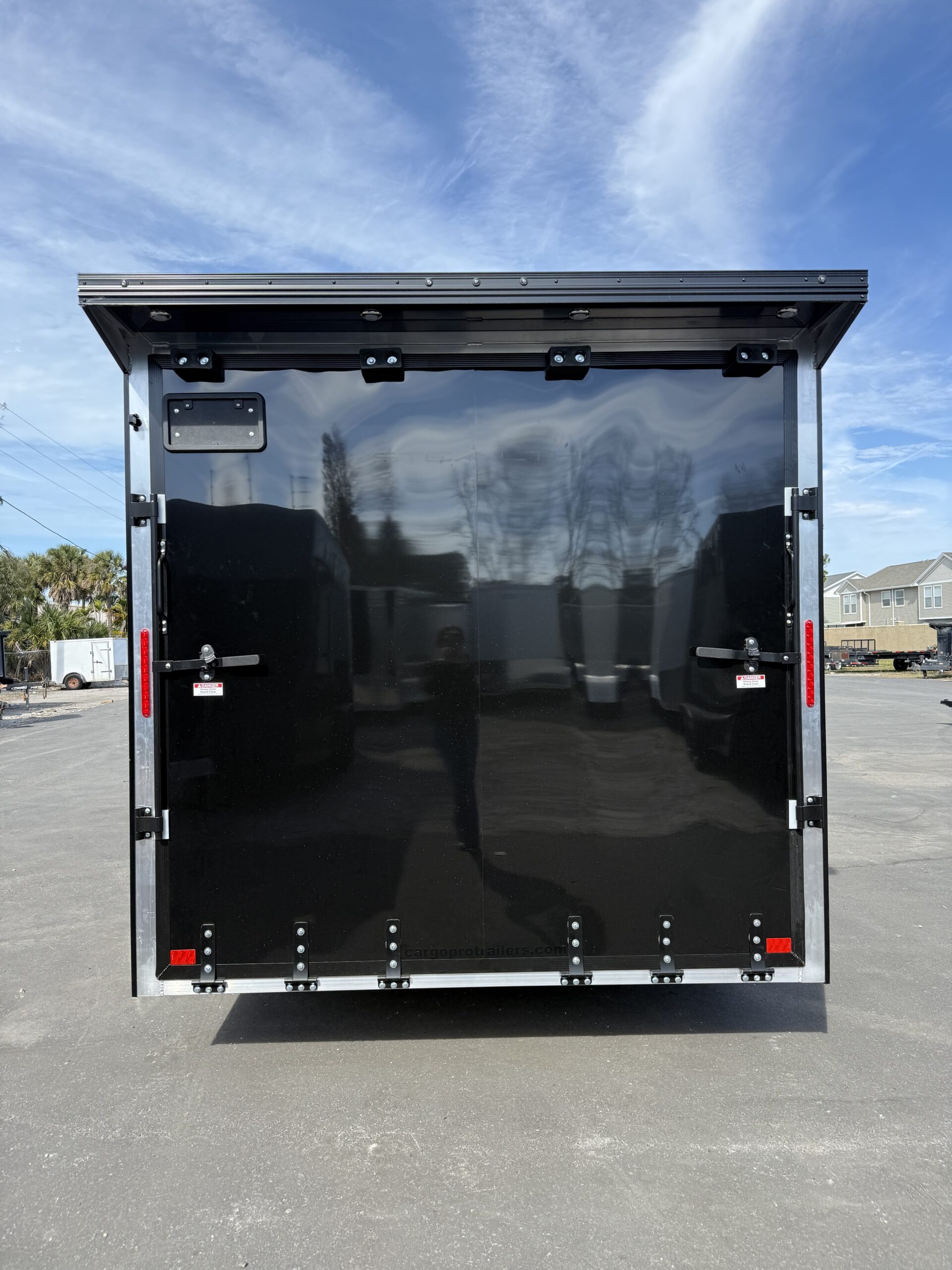 2026 8.5×16 ALCOM STEALTH blacked out ALUMINUM enclosed car hauler w/ spoiler and spare tire - Image 2